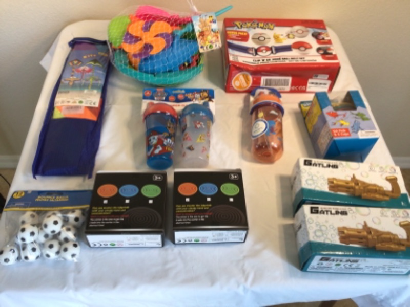 Photo 1 of Kid’s Toy Bundle for Ages 3+- DIY Toy Plastic Garden Set, Bean Bag Toss Game, Play Doctor Set, Shake Your Body Dance Set Bells, Kite, Handheld BB Labyrinth Game (2), Bubble Guns (2), Paw Patrol Sippie Cups, Sippie Cup, Dr Seuss Counting Fish with Cups, Bo