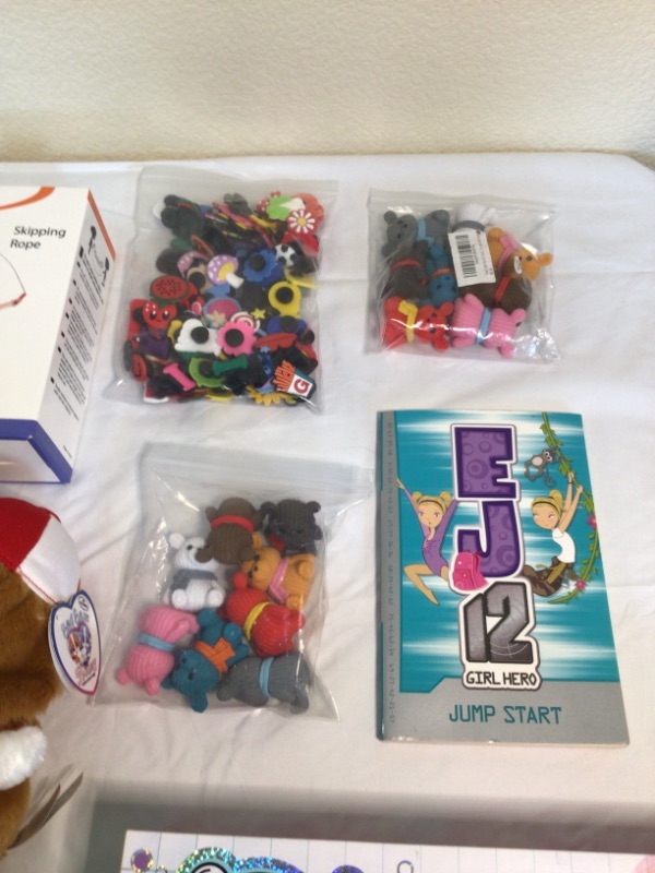 Photo 5 of Small Bundle of Children's Toys Items- 1) Whale Water Sprinkler 2) Dinosaur Water Guns 3) Jump Rope 4) Sad Sam Plush Dog 5) 3 Packages Small Figurines 6) DIY Bath Bombs  7) Diy Soap Factory 8) Water Balloons