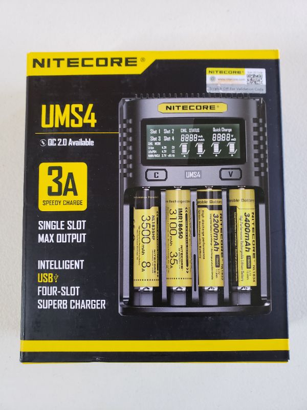 Photo 1 of Nitecore UMS4 USB Universal 4-Port Speedy Smart Charger for Li-Ion/Ni-MH/Ni-Cd/IMR 26650 22650 21700 20700 18650 18490 18350 17670 17500 17335 16340 RCR123 14500 AA AAA C D w/LifeMods Battery Case
