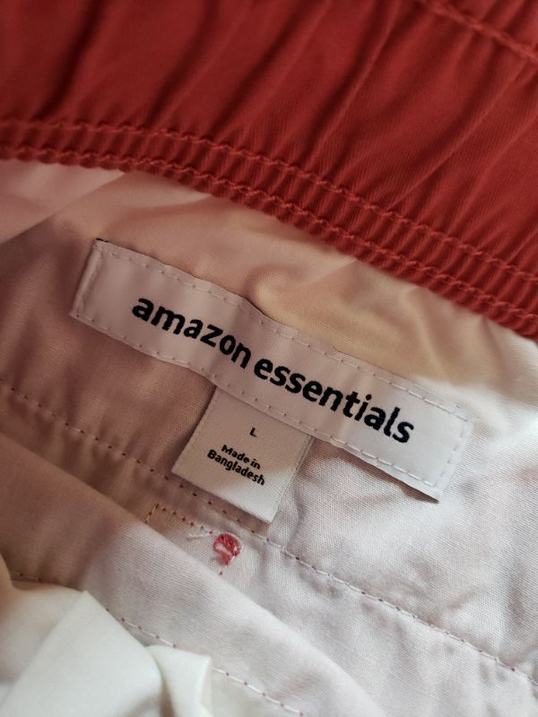 Photo 3 of Unisex Amazon Essential Shorts, Pink/Red, Size Large.