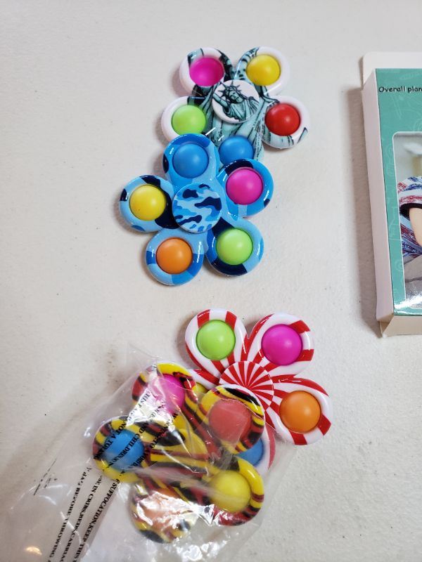Photo 1 of PUSH POP FIDGET TOYS, LOT OF 2 ITEMS.