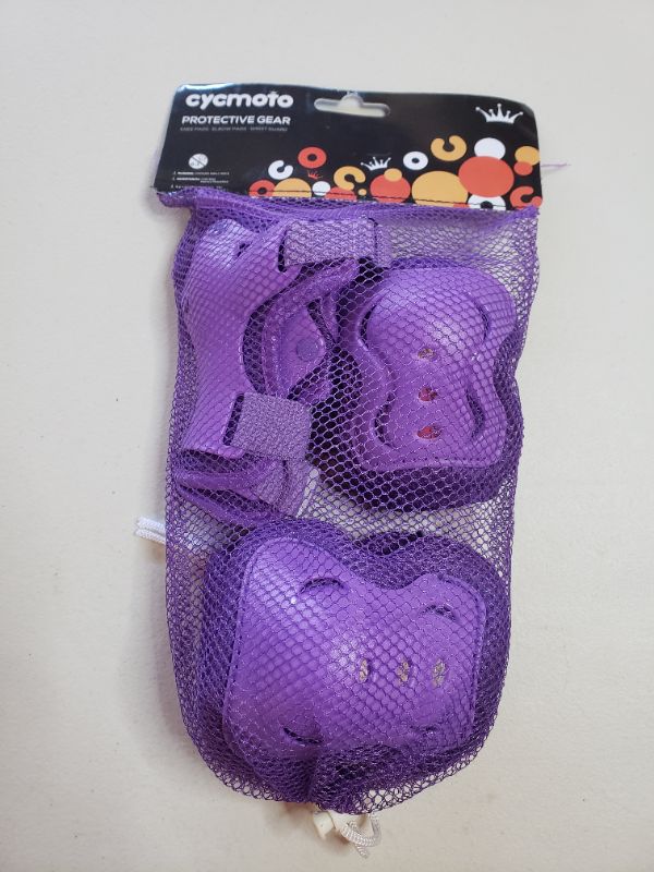 Photo 1 of CHILDREN'S PROTECTIVE GEAR, KNEE PADS/ELBOW PADS/WRIST GUARDS, PURPLE. 