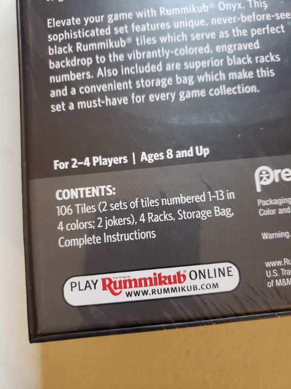 Photo 1 of Rummikub Onyx Edition - Sophisticated Set with Unique Black Rummikub Tiles and Vibrantly-Colored Engraved Numbers by Pressman
