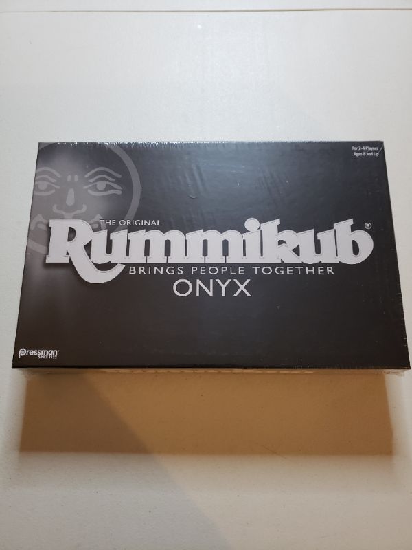 Photo 1 of Rummikub Onyx Edition - Sophisticated Set with Unique Black Rummikub Tiles and Vibrantly-Colored Engraved Numbers by Pressman
