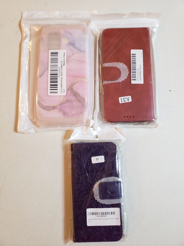 Photo 1 of VARIOUS SAMSUNG SMARTPHONE CASES, STYLE AND MODELS VARY, LOT OF 3.