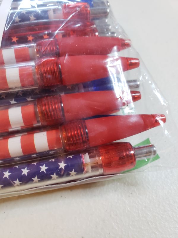 Photo 2 of AMERICAN FLAG BALL POINT PENS. APPROX. 25 PENS.