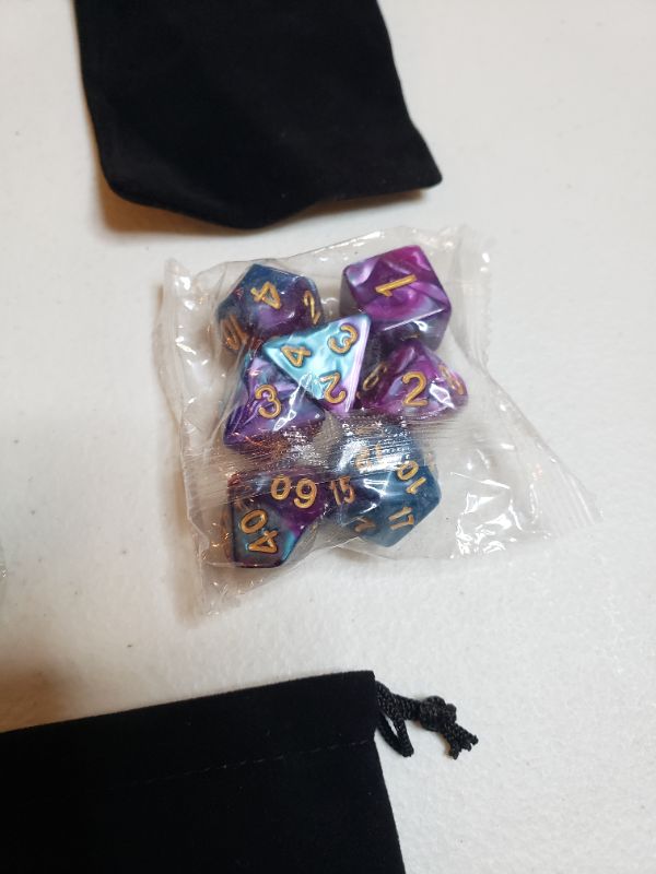 Photo 2 of 5 SETS OF GAME DICE WITH CARRYING BAGS.