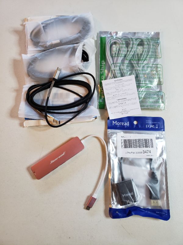 Photo 1 of VARIOUS CHARGING CABLES AND USB HUB.