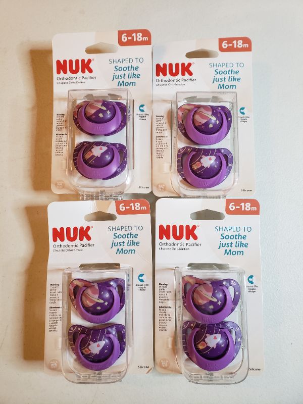 Photo 1 of NUK Orthodontic Pacifiers 618 Months Pack, Outer Space
LOT OF 4 BOXES.