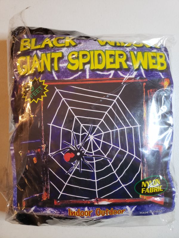 Photo 1 of HALLOWEEN BLACK WIDOW GIANT SPIDER WEB, INDOOR/OUTDOOR. 9FT.