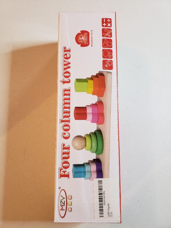 Photo 1 of FOUR COLUMN TOWER WOODEN BLOCK CHILDREN'S TOY.