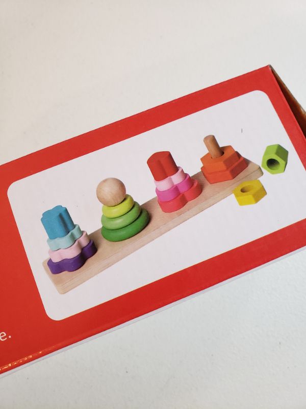 Photo 1 of FOUR COLUMN TOWER WOODEN BLOCK CHILDREN'S TOY.