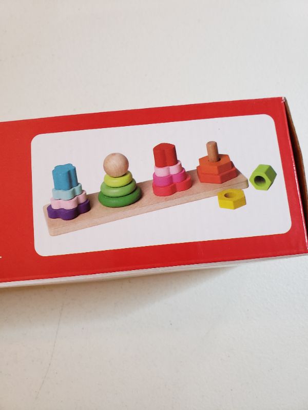 Photo 2 of FOUR COLUMN TOWER WOODEN BLOCK CHILDREN'S TOY.