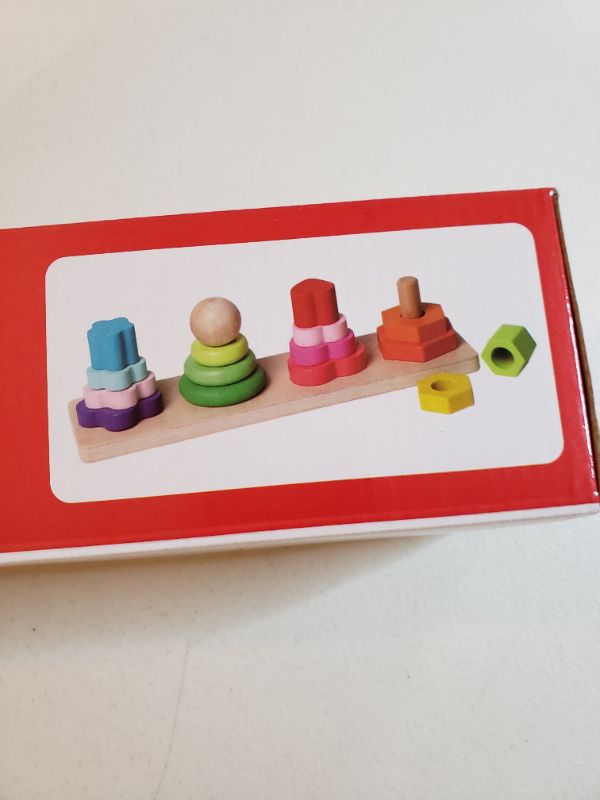 Photo 2 of FOUR COLUMN TOWER WOODEN BLOCK CHILDREN'S TOY.