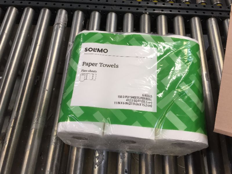 Photo 1 of Amazon Brand - Solimo Basic Flex-Sheets Paper Towels 12 rolls 