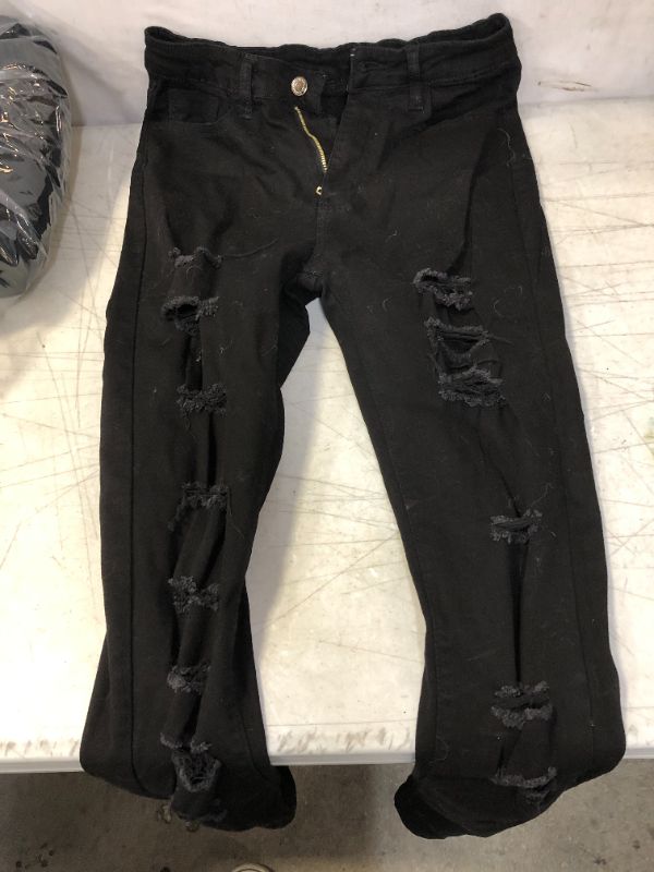 Photo 1 of BLACK WOMENS RIPPED JEANS SIZE 5 (MAYBE) 