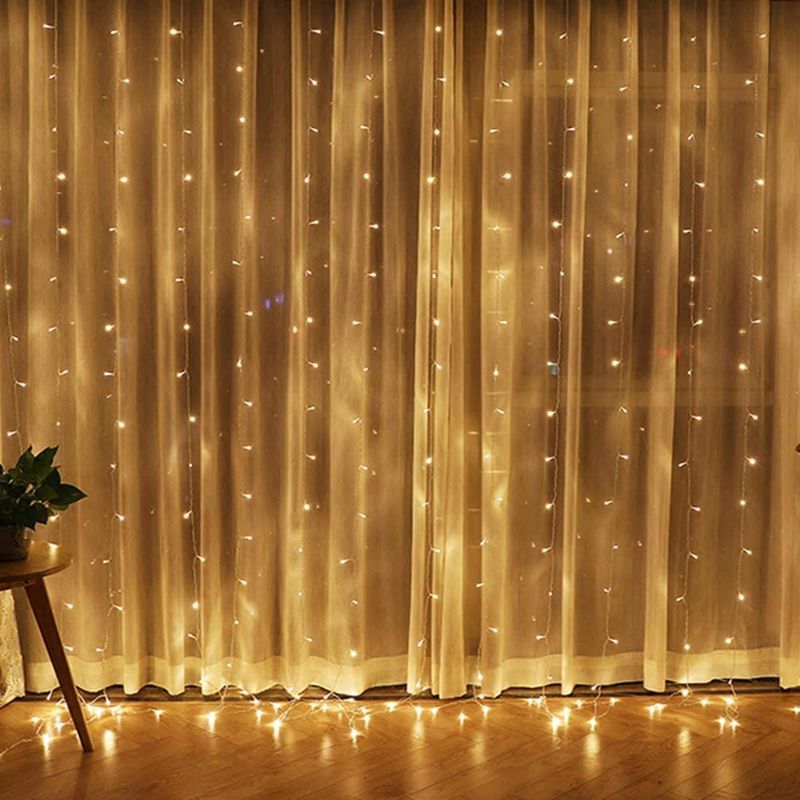 Photo 1 of Twinkle Star 300 LED Window Curtain String Light for Christmas Wedding Party Home Garden Bedroom Outdoor Indoor Wall Decorations (Warm White)