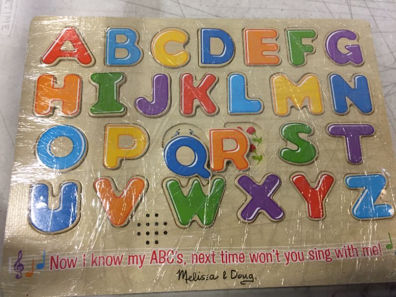 Photo 2 of Melissa & Doug Wooden Alphabet Sound Puzzle - Wooden Puzzle With Sound Effects (26 pcs)