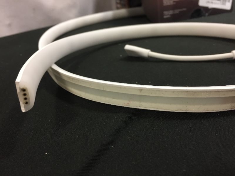 Photo 2 of ***Extension Only*** Philips Hue Bluetooth Gradient Ambiance Smart Lightstrip 3ft Extension NO Plug, (Muticolor Strip, Works with Apple Homekit and Google Home), White ---USED---
