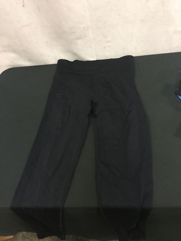 Photo 1 of black leggings black unknow size  ,minor used and dirty