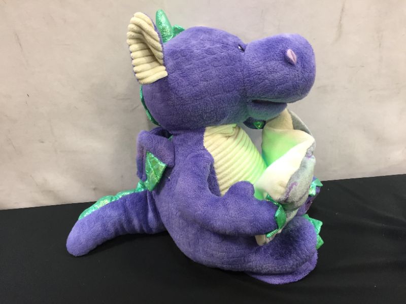 Photo 1 of Cuddle Barn | Dalton the Storytelling Dragon 12" Animated Stuffed Animal Plush Toy | Mouth Moves, Head Sways and Book Lights Up | Recites 5 Fairy-Tales
