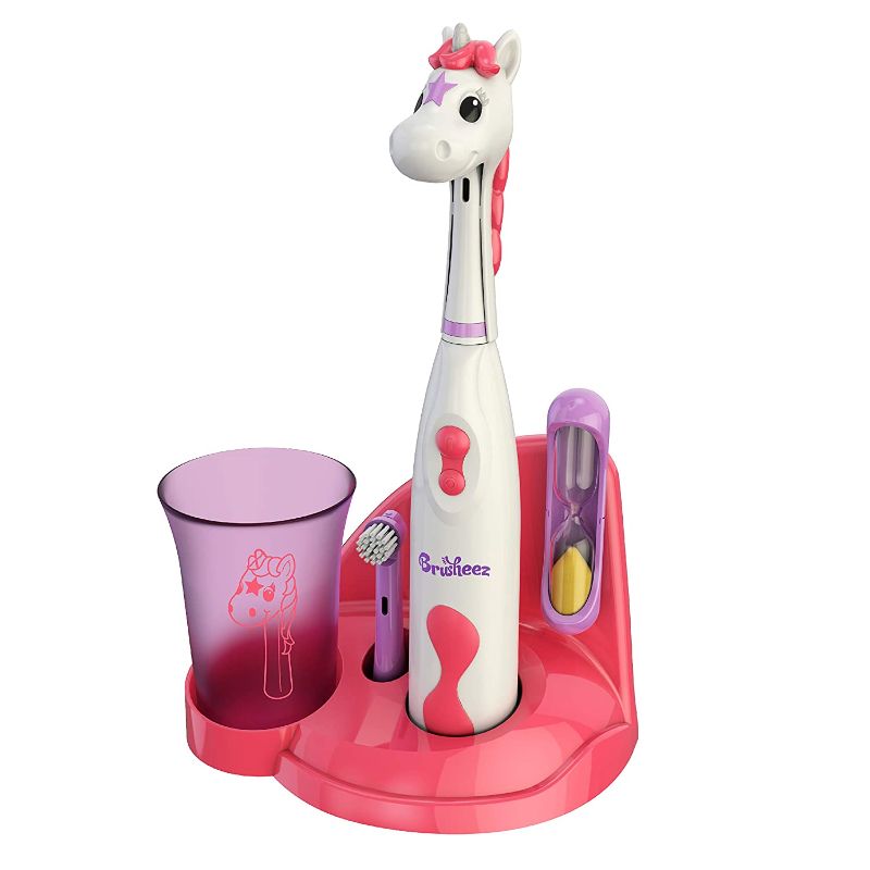 Photo 1 of Brusheez® Kids Electric Toothbrush Set, Soft Bristles, Easy Push Power Button, Battery Operated, 2 Brush Heads, Animal Cover, Sand Timer, Rinse Cup and Storage Base - Starting at 3 years (Sparkle The Unicorn)