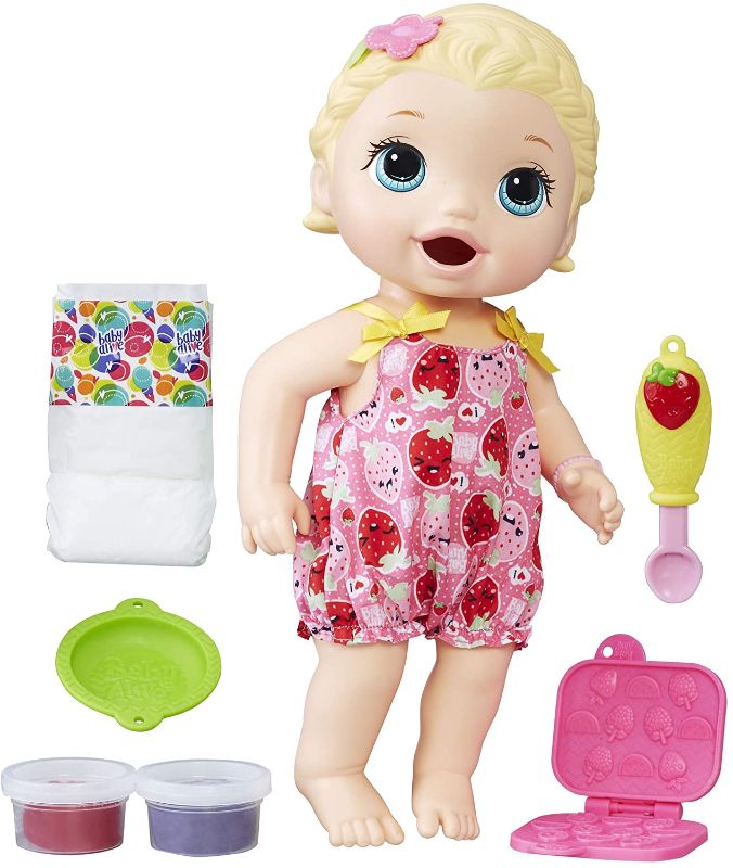 Photo 1 of Baby Alive Super Snacks Snackin 'Lily Baby Doll: Blonde eating doll, with reusable doll food, spoon and 3 accessories, perfect doll for boys and girls ages 3 and up.