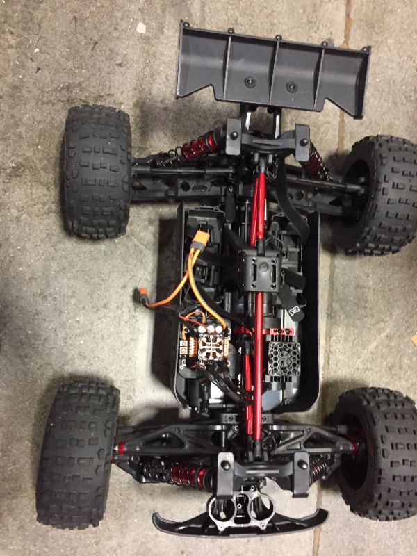 Photo 4 of ARRMA RC Truck 1/5 Outcast 4X4 8S BLX Stunt Truck RTR (Ready-to-Run Transmitter and Receiver Included, Batteries and Charger Required), ARA5810