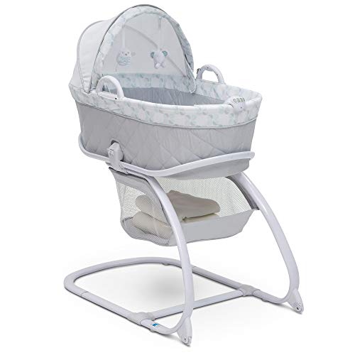 Photo 1 of Delta Children Deluxe 2-in-1 Moses Bedside Bassinet Portable Crib, Windmill