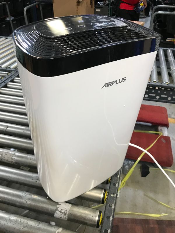 Photo 2 of airplus rolling dehumidifier 