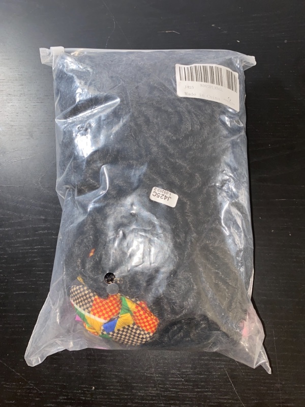 Photo 1 of Miscellaneous wig, curly black, sold as is