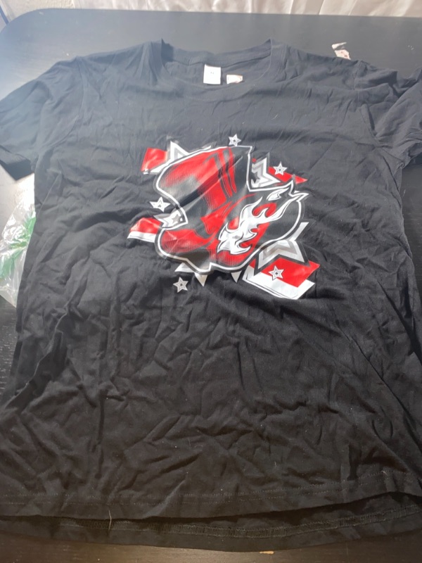 Photo 1 of Miscellaneous graphic t-shirt, medium, sold as is