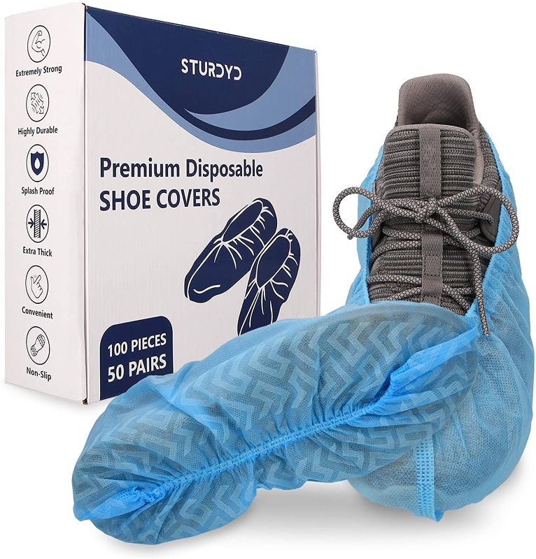 Photo 1 of Disposable shoe covers non slip – Sturdyd – 100 Pack (50 pairs) – 35 GSM Indoor Shoe Booties – Non-Slip & Water Resistant, Large, fits up to US Men's 12 & Women's 14 Shoe Sizes – Sturdy & Durable