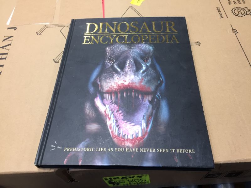 Photo 1 of Dinosaur Encyclopedia - Prehistoric Life As YOU Have Never Seen It Before Hardcover – January 1, 2006
