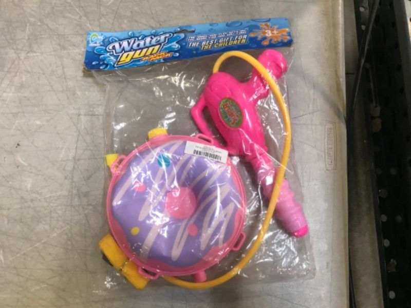 Photo 1 of kids generic water gun backpack pink