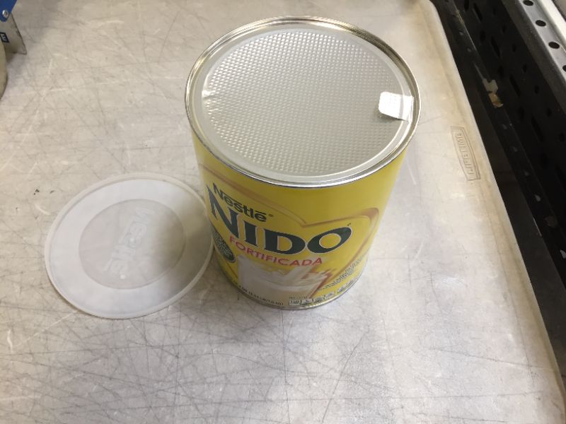 Photo 2 of NESTLE NIDO Fortificada Dry Milk 56.4 Ounce Canister expires 31/Dec/2021
