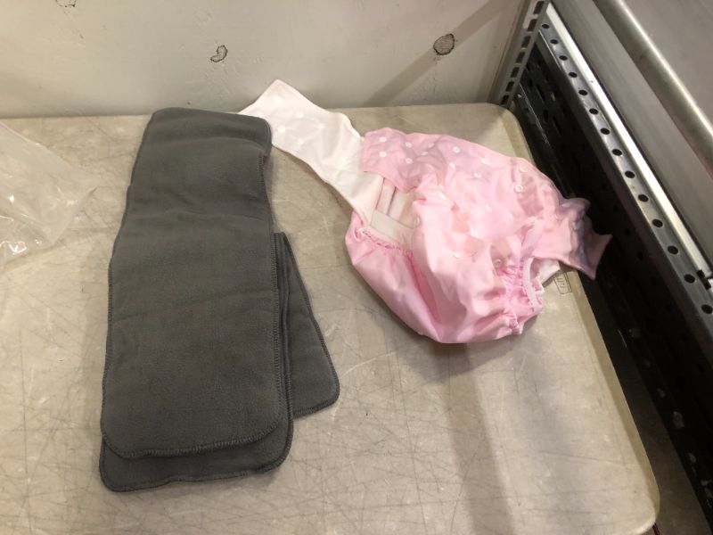 Photo 1 of bundle of clothes 