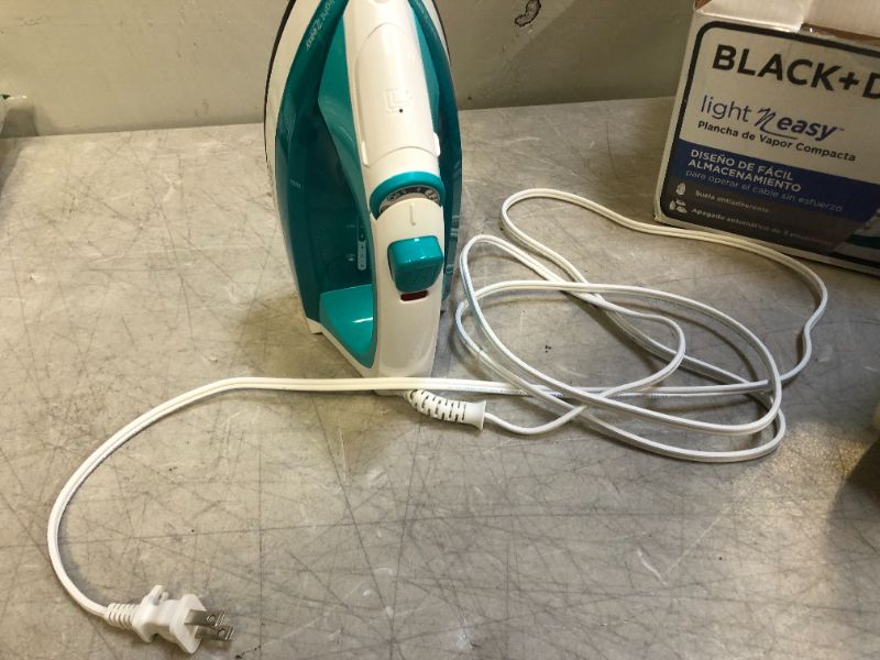 Photo 2 of BLACK+DECKER IR1010 Light 'N Easy Compact Steam Iron, Teal
