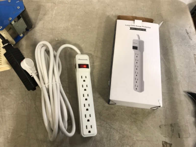 Photo 2 of DEWENWILS 6-Outlet Power Strip Surge Protector, 15FT Long Extension Cord, Low Profile Flat Plug, 15 Amp Circuit Breaker, 500 Joules, Wall Mount, White, UL Listed
