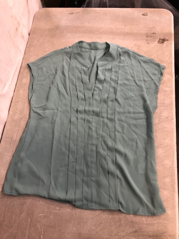 Photo 1 of Generic Green V Neck Sleeveless Blouse. Medium