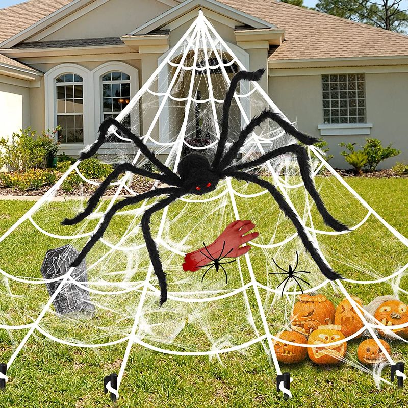 Photo 1 of Halloween Spider Decoration 23FT Spider Web Decor + 45‘’ Giant Spider + Fake Hand, Halloween Decorations Set for Indoor Outdoor Yard Lawn Haunted House Costumes Parties