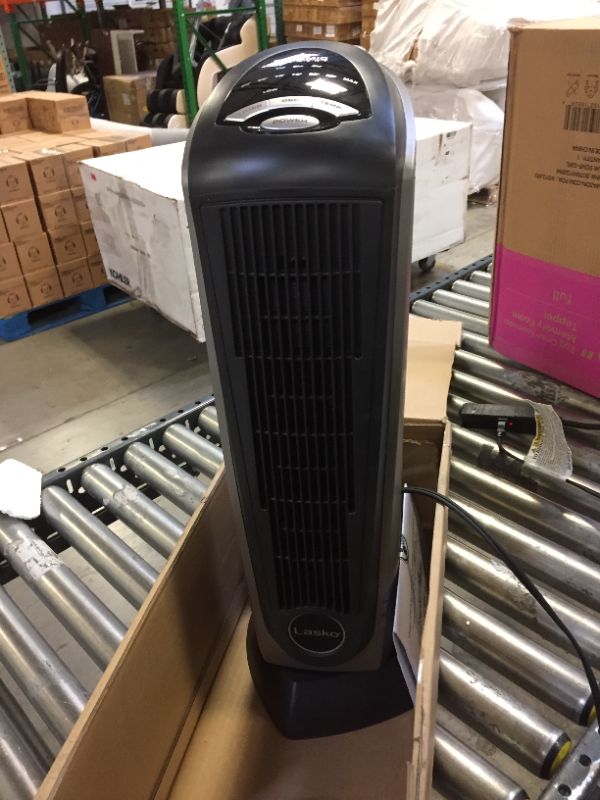 Photo 4 of Lasko Lasko-22 Digital Ceramic Oscillating Remote (751320) Tower Heater, 8.5x2033 L x 7.25x2033 W x 23x2033 H, Grey/Black
