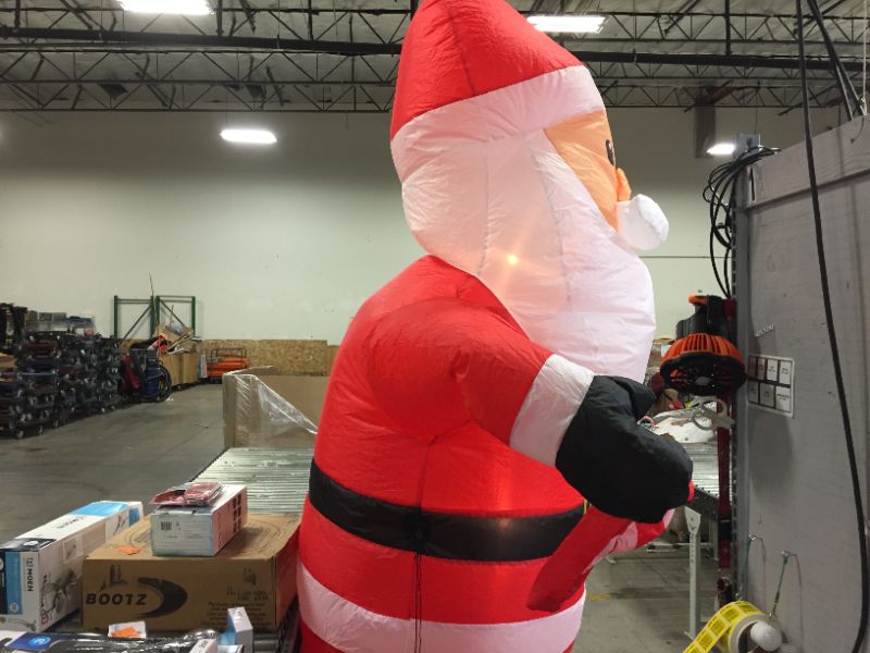 Photo 3 of 11 ft. Airblown Santa with Candy Cane Christmas Inflatable