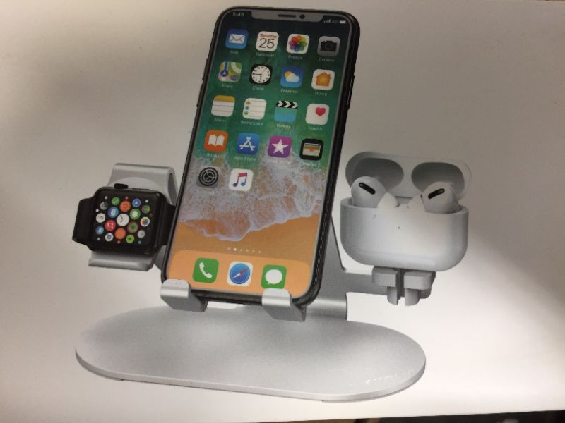 Photo 1 of multi function apple charging watch stand for apple watch -air pods- iphone- ipad