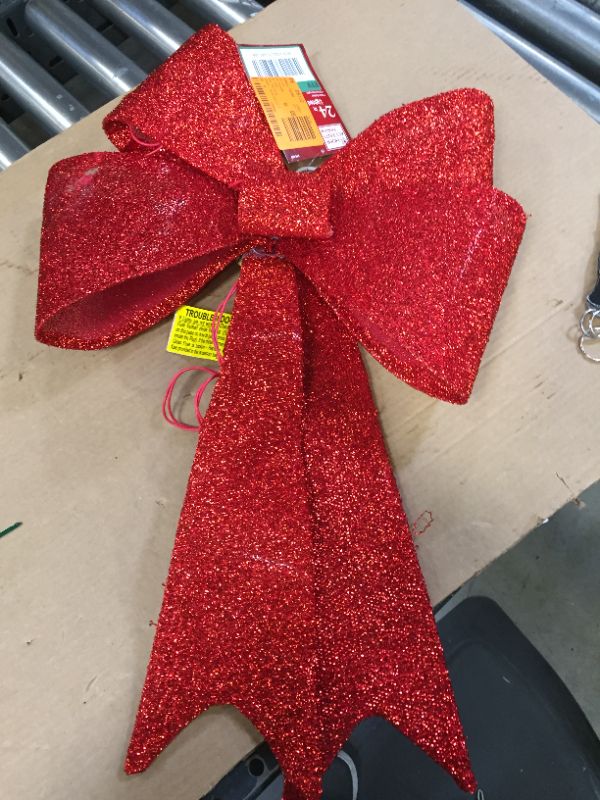 Photo 2 of 24 in Lighted Red Tinsel Bow Yard Sculpture
