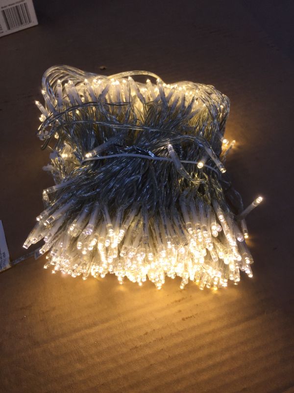 Photo 1 of 12.66 ft. 600-Light Warm White Weeping Willow LED Steady Lit Icicle Lights
