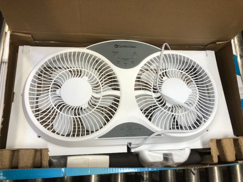 Photo 2 of Comfort Zone CZ310R 3-Speed 3-Function Expandable Reversible Twin Window Fan with Remote Control, Removable Cover