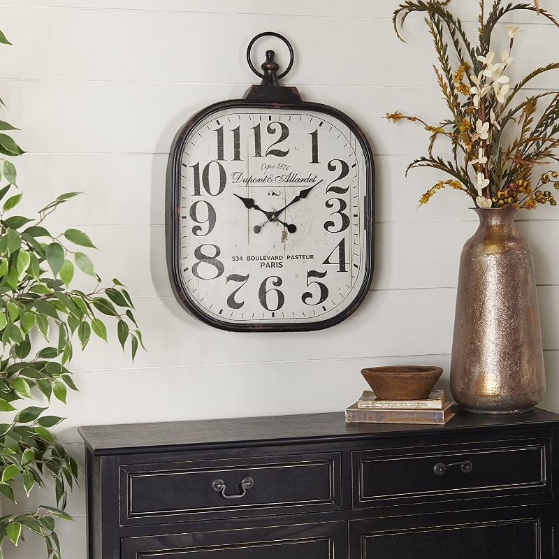 Photo 1 of Deco 79 52560 Metal Glass Wall Clock, 18" x 26"