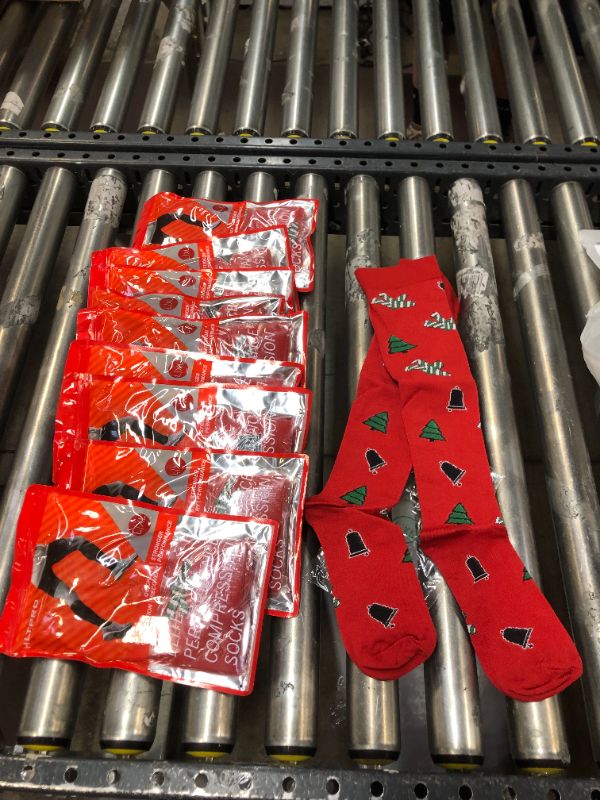 Photo 1 of 10 pack of Christmas themed compression socks sized large 