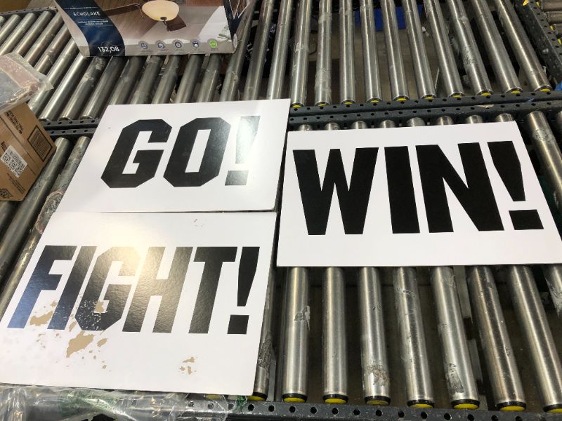 Photo 1 of 23 X 17 INCH WIN GO FIGHT SIGNS - MINOR DAMAGE TO SIGNS